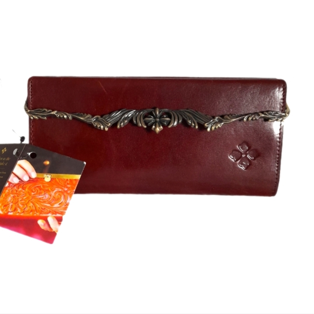 PATRICIA  NASH CLUTCH PURSE GENUINE LEATHER. COLOR BRITISH TAN RFID PROTECTED .